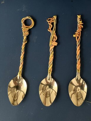 Three creative handcrafted coffee spoons