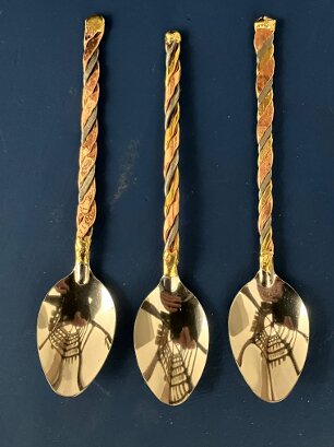 Three twisted handcrafted coffee spoons